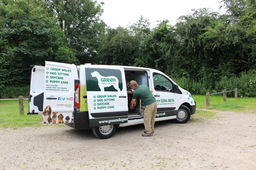 An air-conditioned Green Dog Walking van